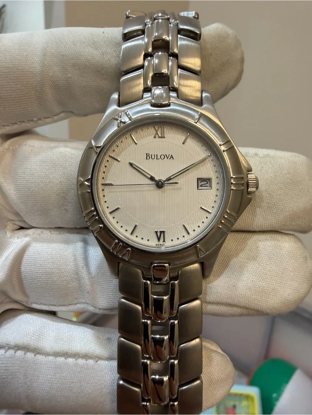 Bulova 96B21 Stainless Steel White Pinstripe Dial Roman Bezel Quartz Watch T9